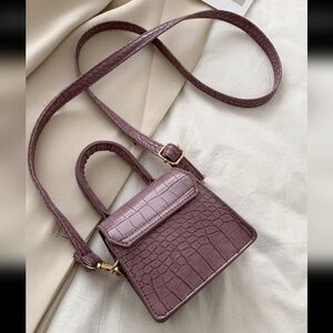 Purple mini crocodile bag
